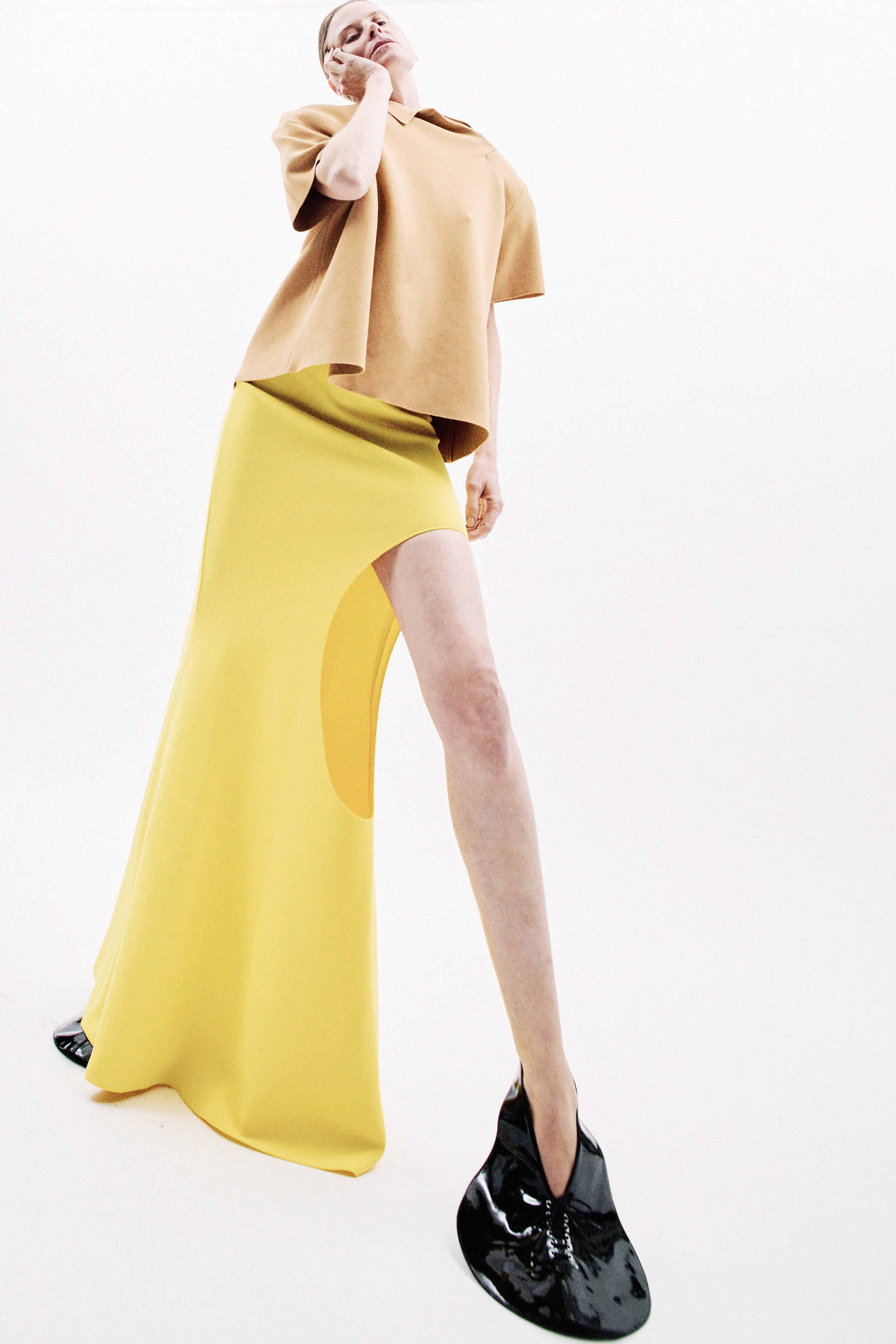 Yellow A.W.A.K.E. Mode sculptural skirt for modern wedding guest dressing