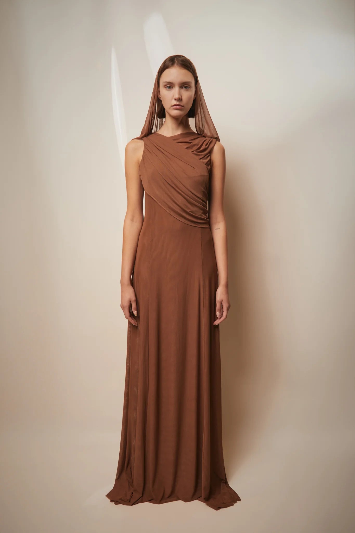Brown Teresa Helbig draped gown for black tie wedding guest dressing