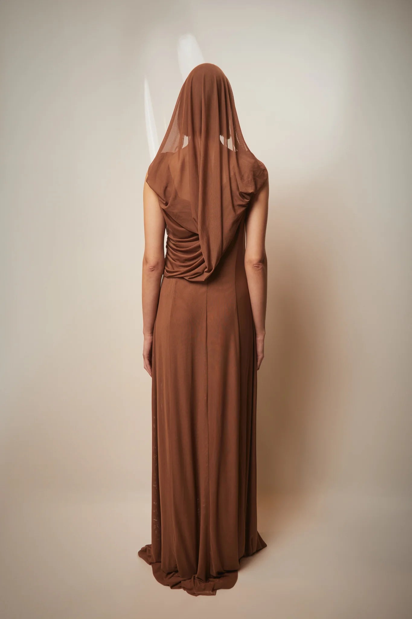 Brown Teresa Helbig draped gown for black tie wedding guest dressing