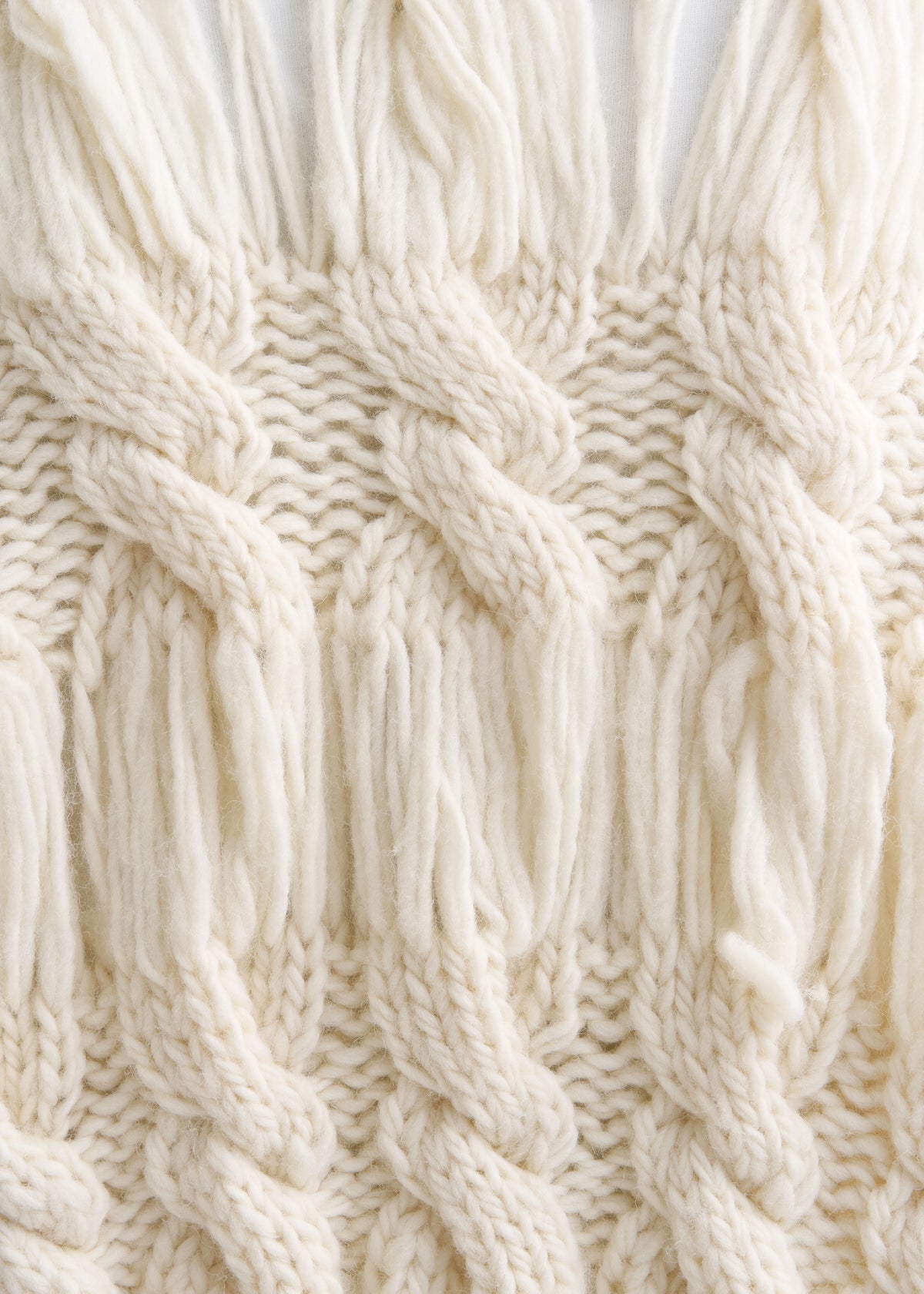 OPEN CABLE-KNIT SWEATER