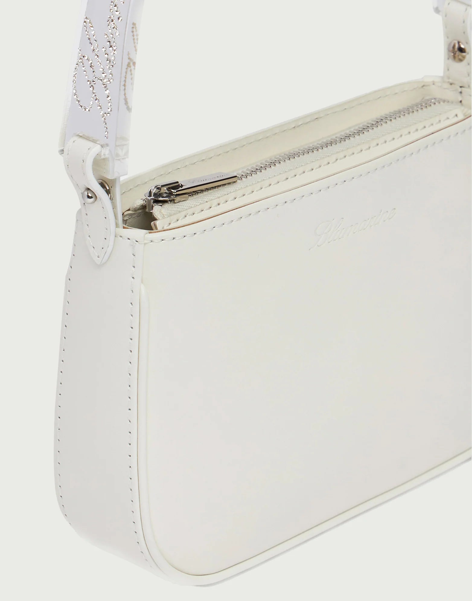 NAPA LEATHER BAG WITH A BRANDED HANDLE IN PLEXI WHITE