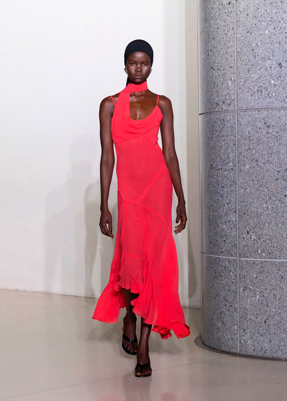 Red Vaillant Studio gown for black tie wedding guest dressing