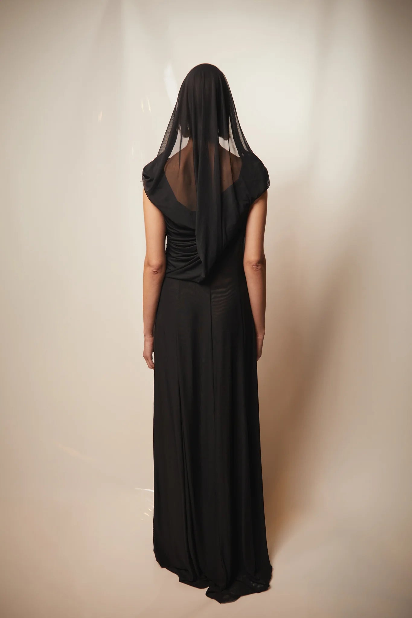 Black Teresa Helbig gown for black tie wedding guest dressing