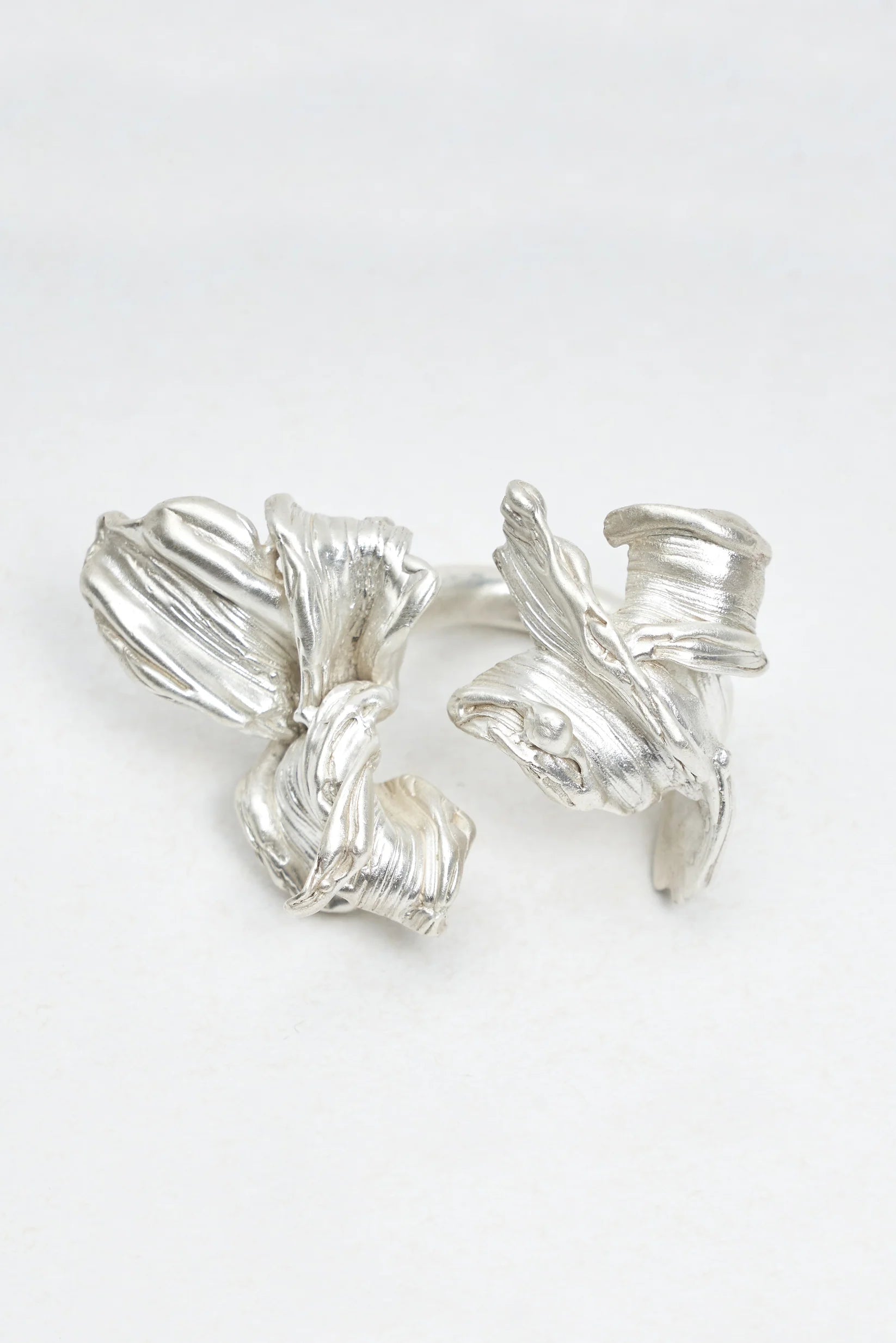TORN OPEN RING