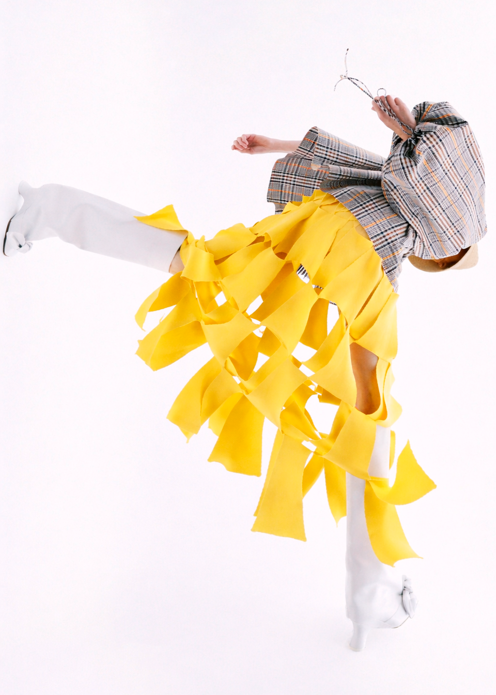 Yellow tiered A.W.A.K.E. Mode skirt for modern wedding guest dressing